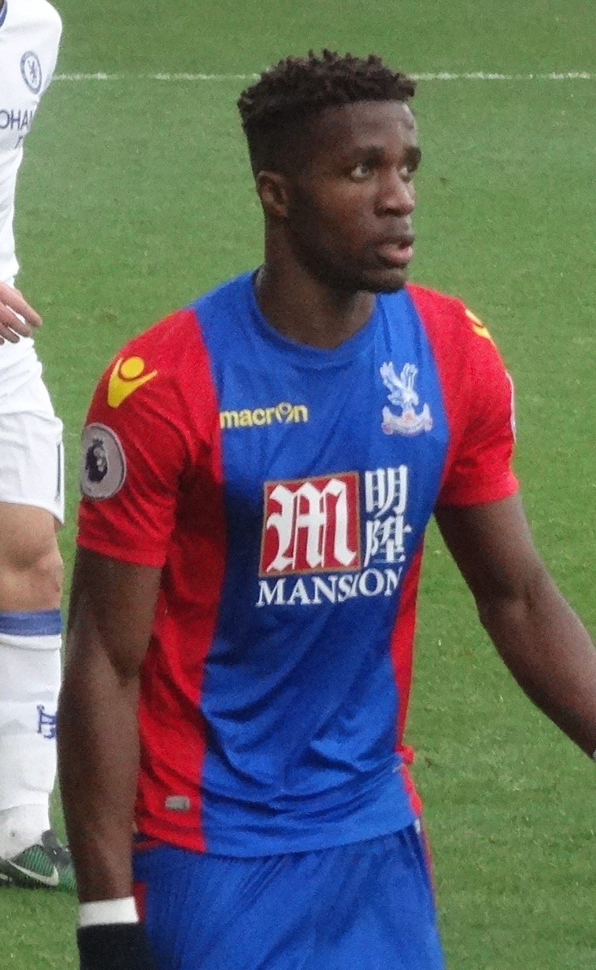 Wilfried Zaha trong màu áo Crystal Palace Wilfried Zaha thi đấu cho Crystal Palace tại Premier League
